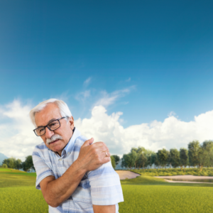 An older man with shoulder pain on a golf course.